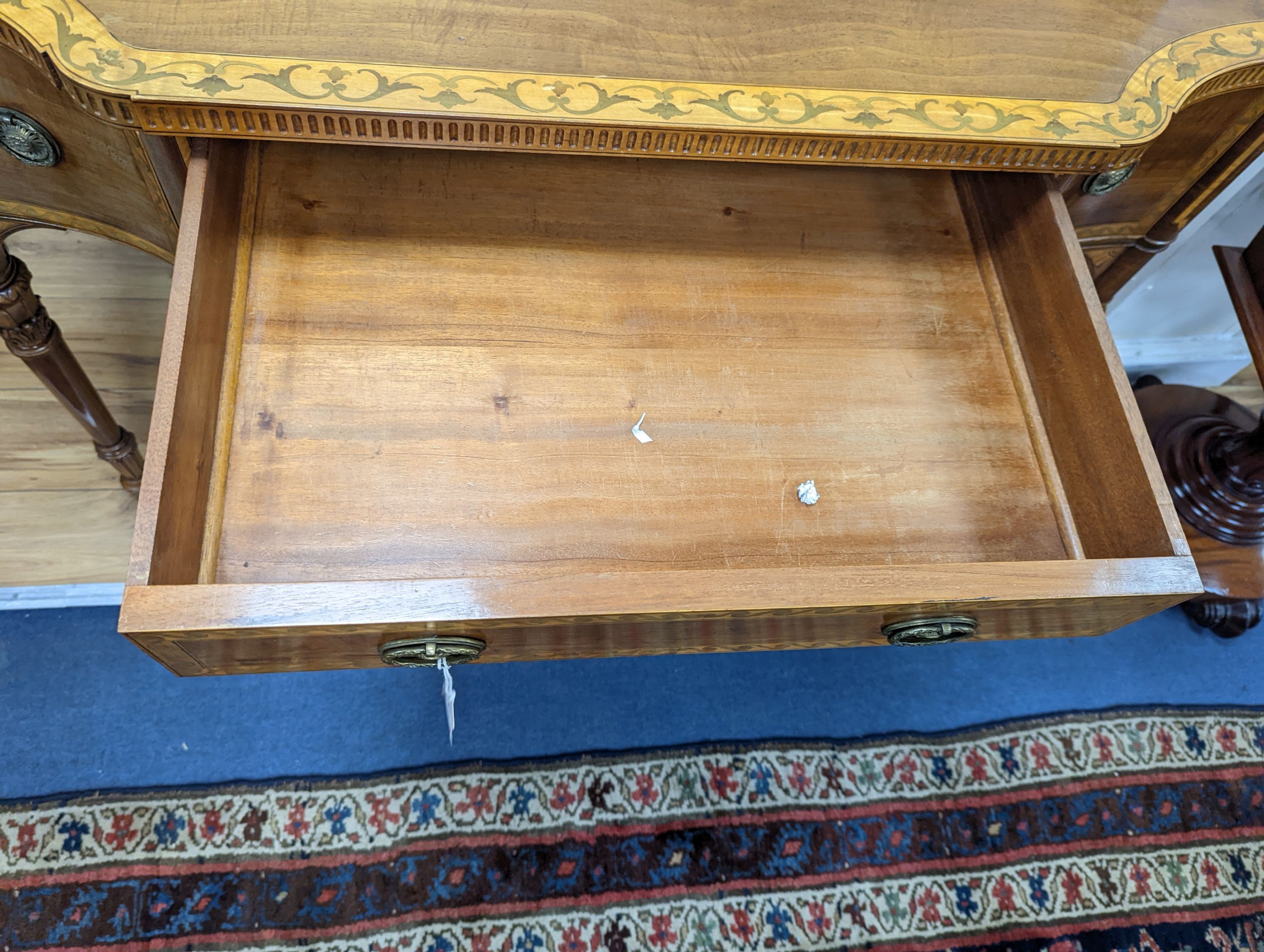 An early 20th century Sheraton style satinwood banded and marquetry inlaid mahogany breakfront sideboard, length 122cm, depth 58cm, height 82cm